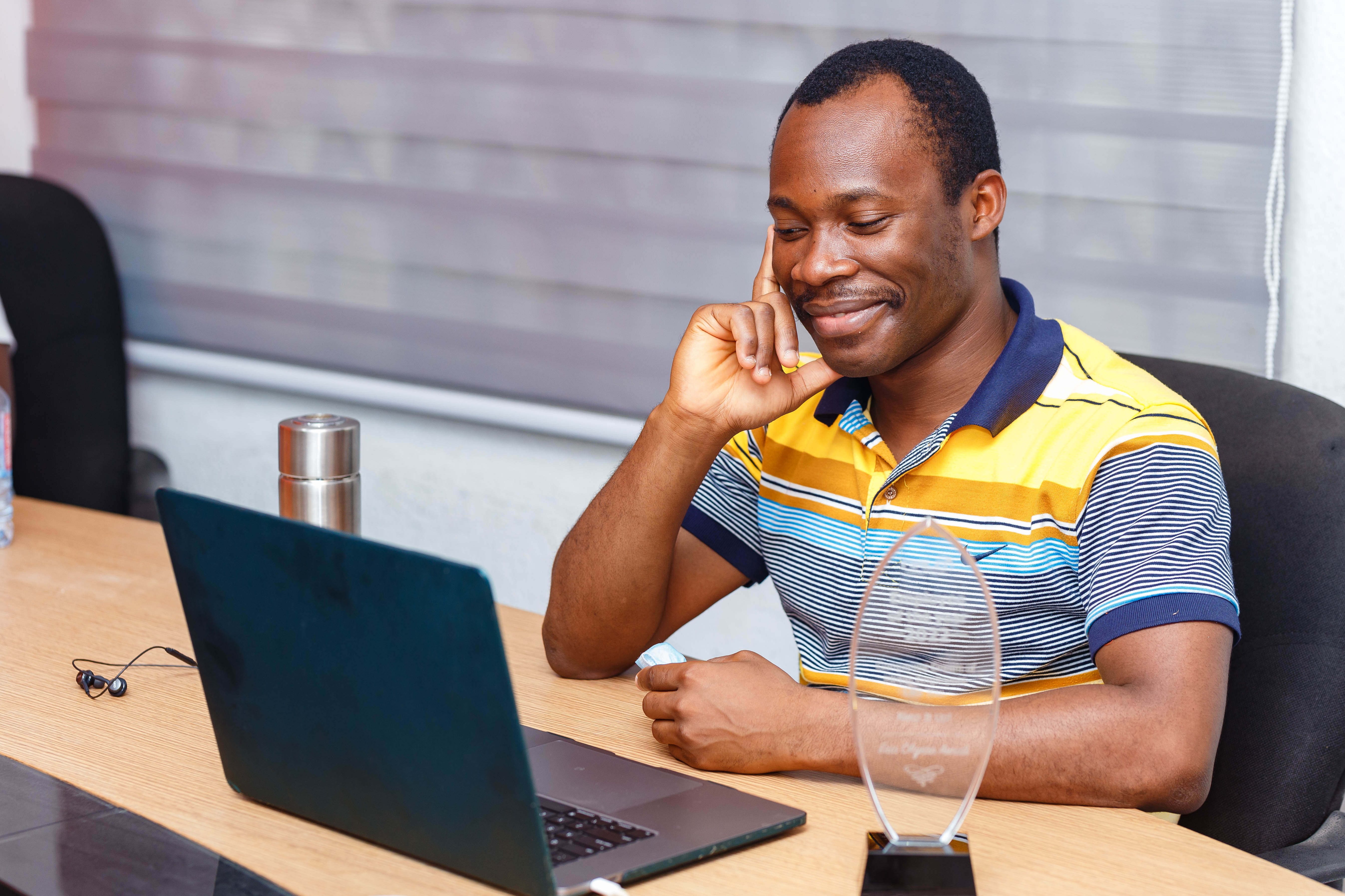 Hero Background Image of Eric Awudi Okyere on an Awards Giving Day